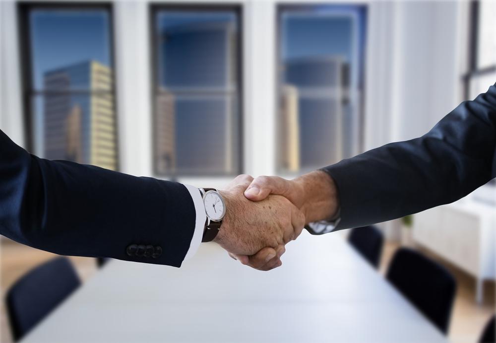 Business handshake-0ad42e8c08a94bcda38de0ade442a8cd.jpg Business handshake